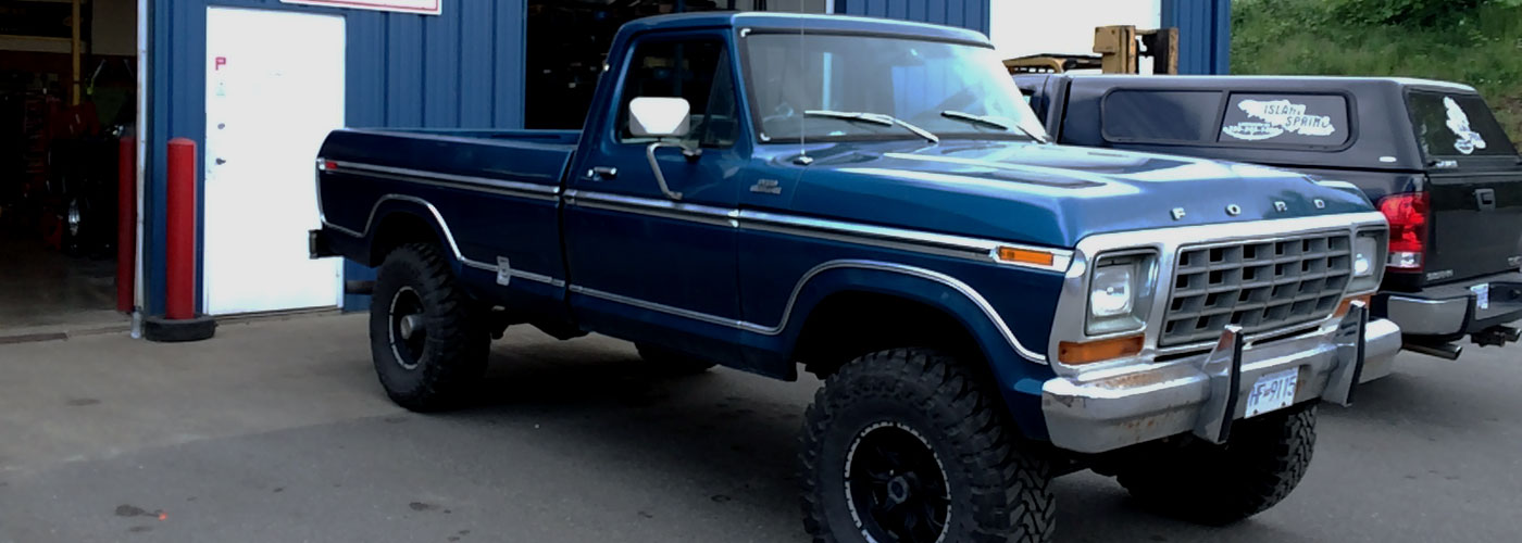 A couple of pickup trucks that were just serviced